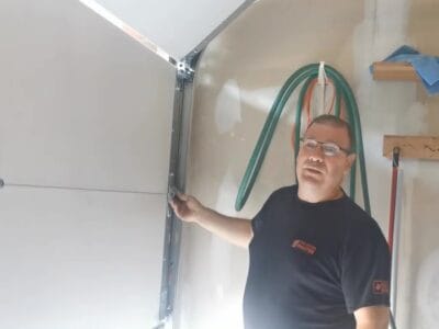 The Door Master DIY- Disengage the garage door.